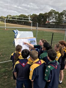 Scouts checking out the plans for their new hall